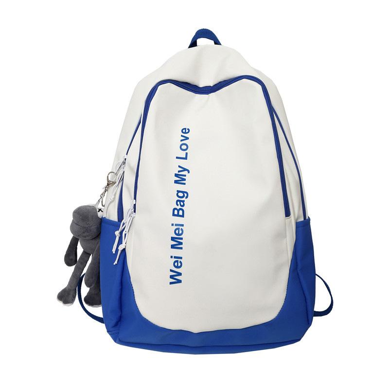 

Large capacity simple travel backpack junior high school student schoolbag double shoulder schoolbag female синий