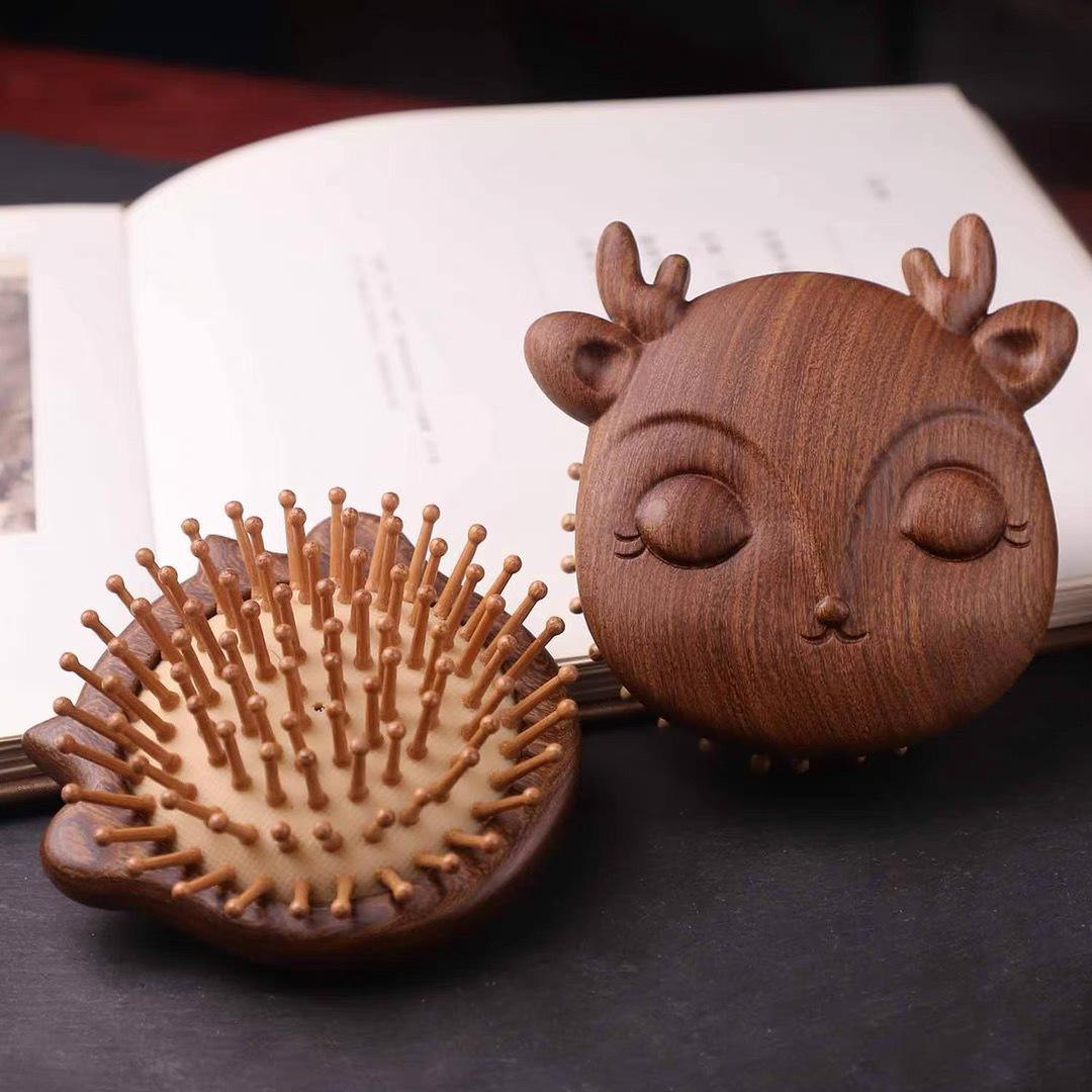 

Black Golden Sandalwood Cartoon Animal Hair Smoothing & Scalp Massage Comb