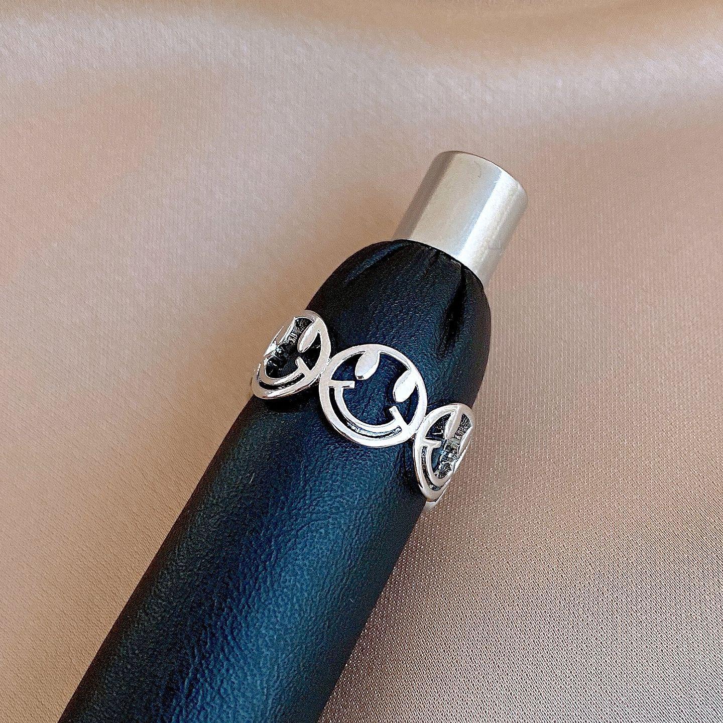 

French ins style simple geometric round smiley face hollow ring niche ring versatile jewelry