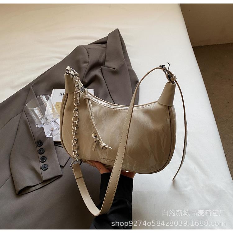 

Design sense foreign style small bag women 2025 new fashion versatile messenger bag summer niche shoulder armpit bag