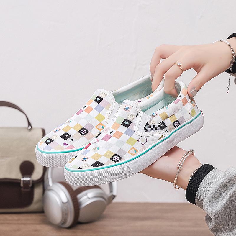 Chaussures Slip-On en toile unisexes 2026: Chaussures plates d'été décontractées style coréen pour étudiants et couples.