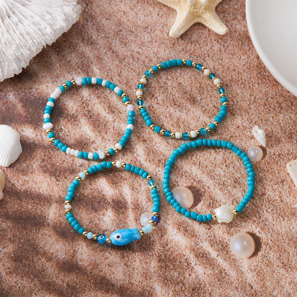 Dehnbare Muschelarmbänder Stapelbarer Strandschmuck Keramik-Fischperlen-Design Handgefertigt Sommer Armband Zubehör