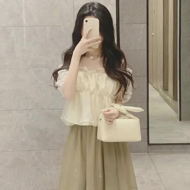 

Женский комплект из топа на одно плечо и юбки-сетки с высокой талией 2024 года M