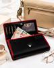 Spacious women's leather wallet with snap and zipper - Peterson