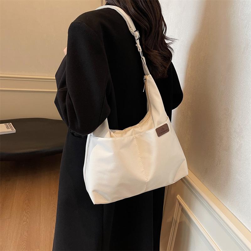 Lightweight canvas bag bag Large capacity women's shoulder messenger bag College student class schoolbag Casual fashion Japanese college