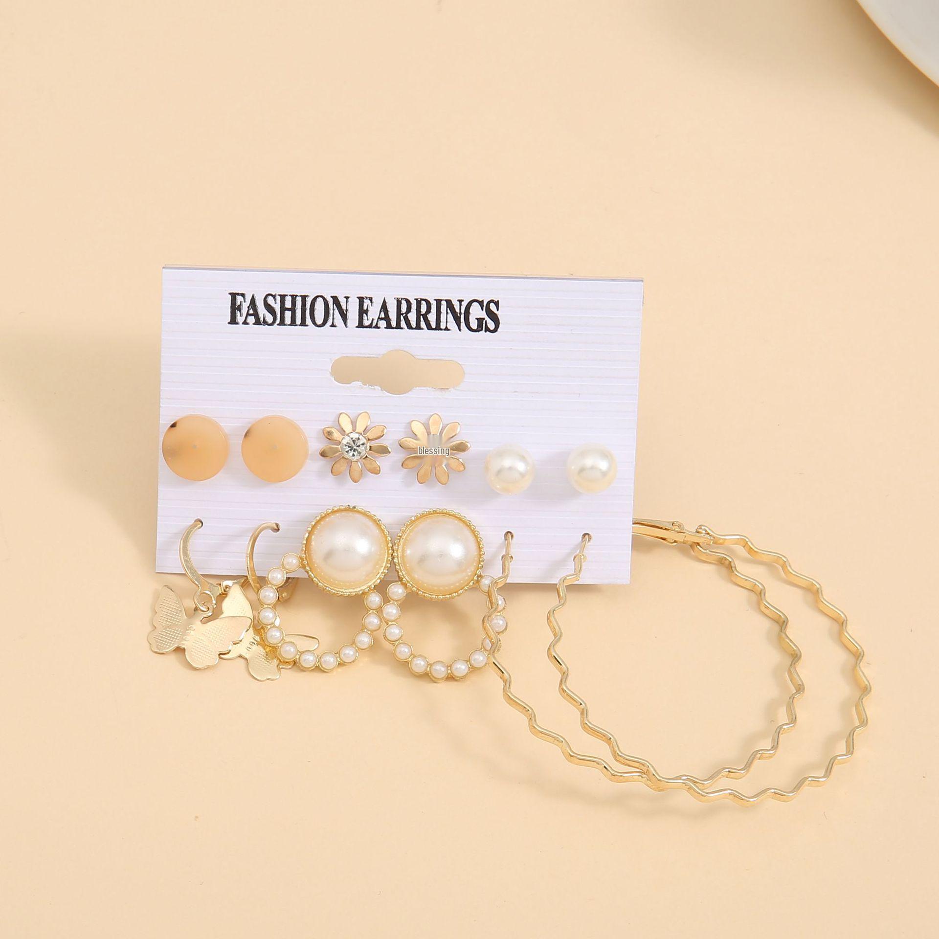 

Изысканный набор трансграничных серег: Жемчужное кольцо с бабочкой, акриловые серьги-гвоздики в виде цветов, преувеличенные серьги-кольца Metal