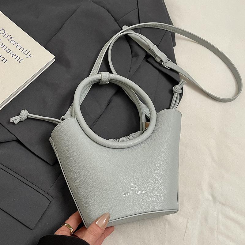 

Spring and summer popular Korean popular high-end sense portable bucket bag temperament casual commuting style versatile shoulder messenger bag