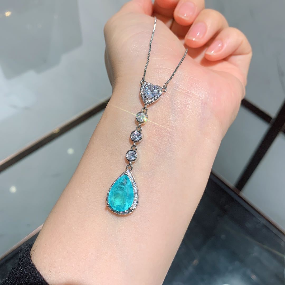 

Ювелирные изделия Ретро Ювелирные изделия Имитация бриллианта Сокровище Пусеты Подвеска Комплект из двух предметов Параиба Серьги