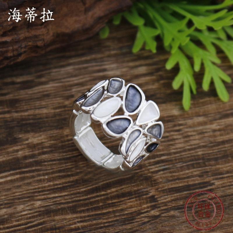 New enamel color hollow geometric petal elastic ring women's simple high-end versatile flower ring