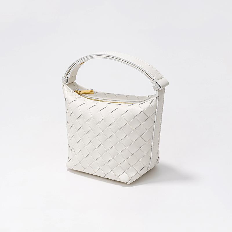 New woven lunch box bag, wind niche design silver bucket bag large capacity leather handbag women