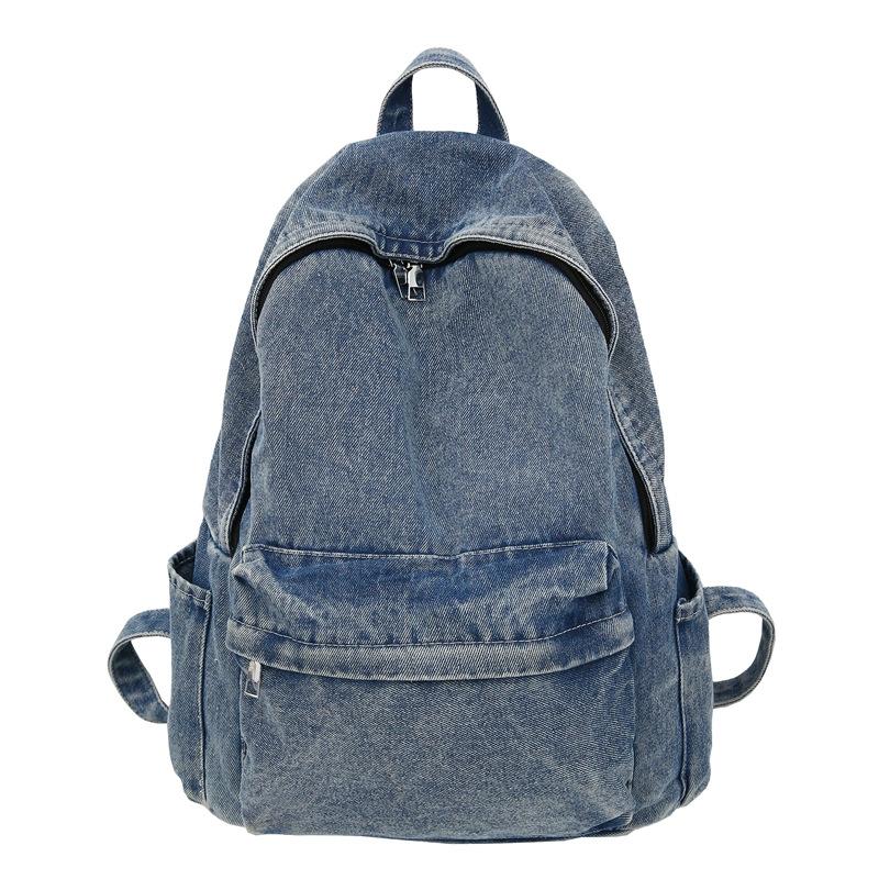 

Versatile denim solid color backpack large capacity middle school student schoolbag men and women the same bag