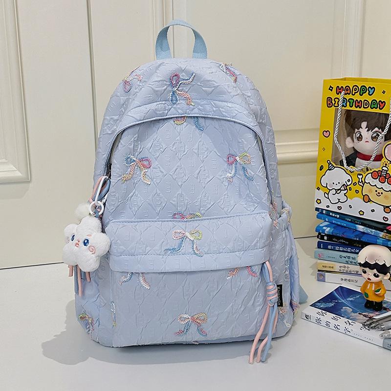 Japanese bow schoolbag for female junior high school students, cute versatile large-capacity backpack, high-value student backpack tide