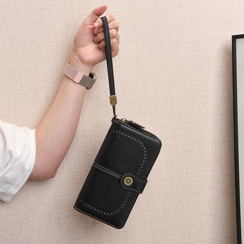 Trendige hohle lange Reißverschluss-Damenbrieftasche & Clutch mit großem Fassungsvermögen