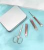 4-Piece Stainless Steel Grooming Set: Nail Clippers, Round Head Nose Hair Trimmer, Ear Pick, In a Gift Iron Box
