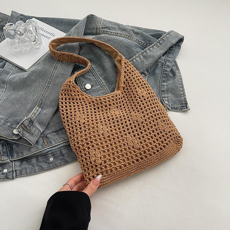 Knitted bag women's large capacity  new spring and summer hollow shoulder shopping bag lazy wind beach tote bag