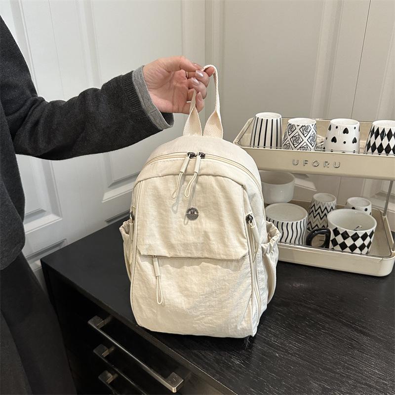 Schoolbag1011 new backpack women's fashion lightweight large-capacity schoolbag Korean version of Oxford cloth versatile women's travel backpack