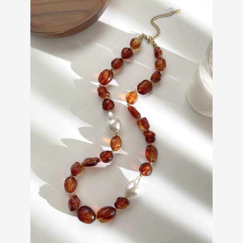 Stylish Red Resin Irregular Bead Necklace With Adjustable Length For Personalized Fit And Artistic Design In Sturdy Alloy Construction.
