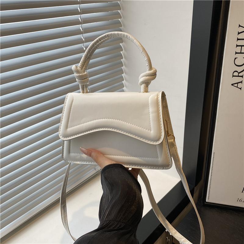 

Fashion niche design bag women s spring and summer new women s bag solid color casual handbag single shoulder messenger bag tide белый