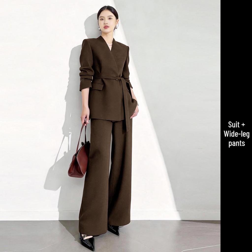 Elegant Coffee-Colored Collarless Skirt Suit for Women with Waist-Cinching Belt - Perfect for Urban Professional Style and Commuting.