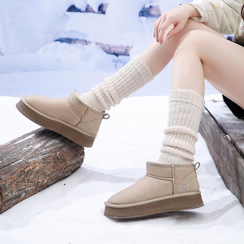 Internet celebrities with the same short tube warm snow boots women's tide year winter new thick-soled velvet short boots Northeast cotton shoes
