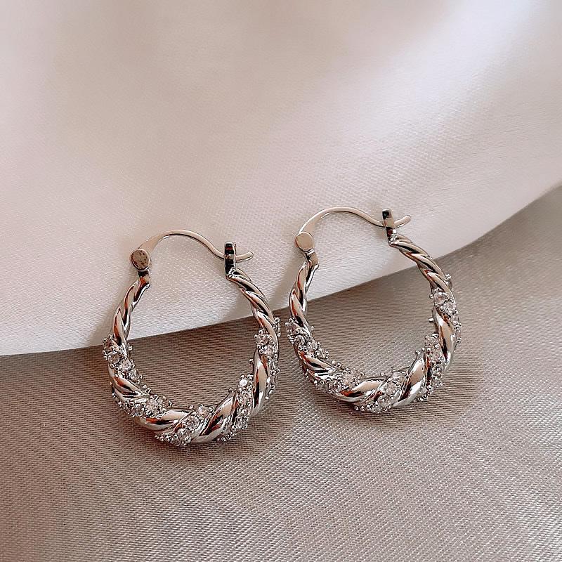 Chic Zircon Twist Ear Cuffs: Elegant, Unique, and Fashionable Earrings for Women.