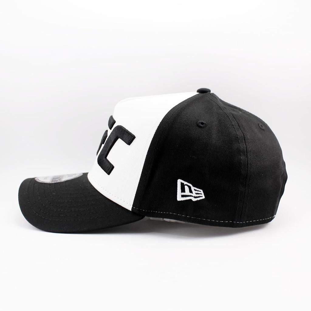 New Era 9FORTY Snapback Cap in collaboration with the Available in white and Adjustable size for men and UFC. black. women. [Used]