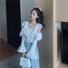 Autumn new flared sleeve shirt women's V-neck ruffle edge shirt pure desire wind hollow off the shoulder loose and thin top