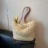 Handwoven Straw Tote Bag with Leather Handles and Open Weave Design Perfect for Summer Beach and Casual Outings