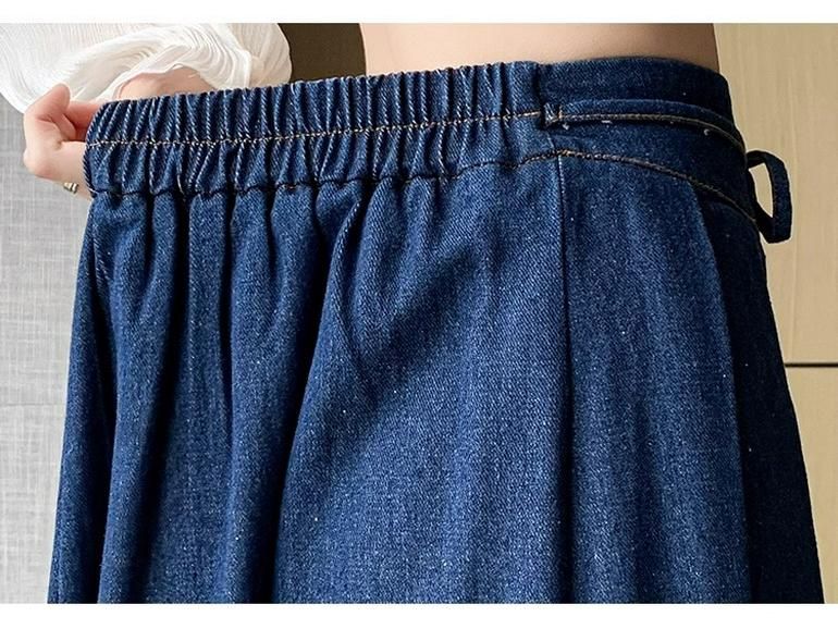 2025 Frühling/Sommer Koreanischer A-Linien Denim Midirock mit plissiertem Saum und elastischer hoher Taille.