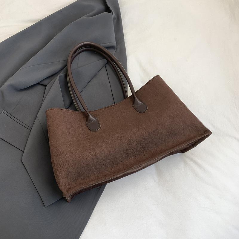 

Suede retro large-capacity armpit bag, new fashion women s bag, high-end tote bag, commuter shoulder bag.