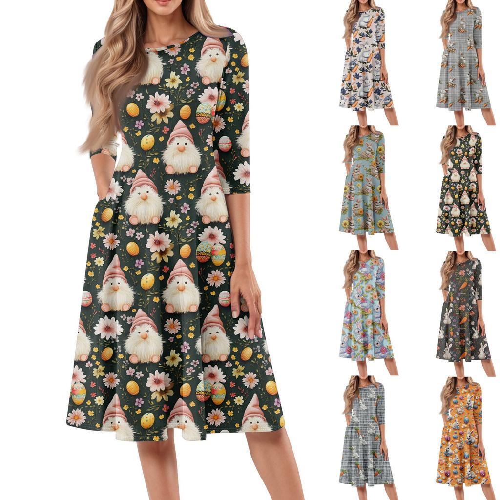 Dámské volné ležérní a módní šaty střední délky s potiskem, kulatým výstřihem a sedmčtvrtečními rukávy