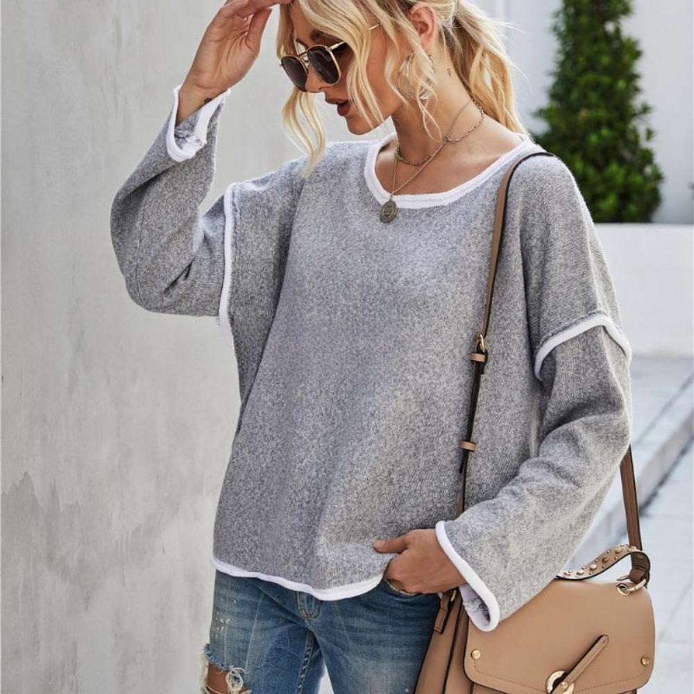 Женский вязаный свитер с круглым вырезом и кисточкой на спине — фото 5