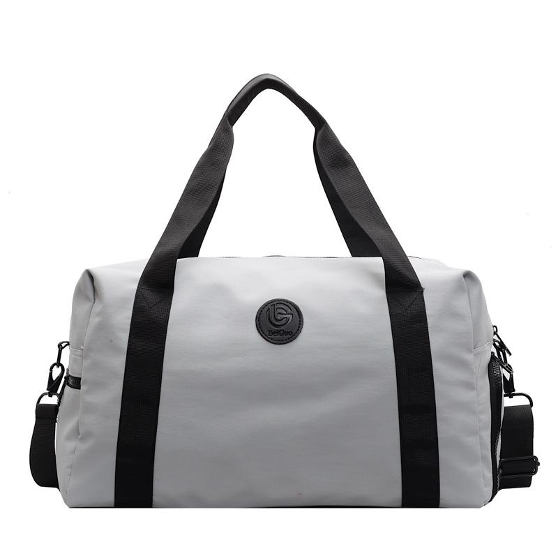 Solid color high-end short-trip bag can be set with tie rod, independent shoe position, dry and wet separation, multi-functional luggage boarding bag