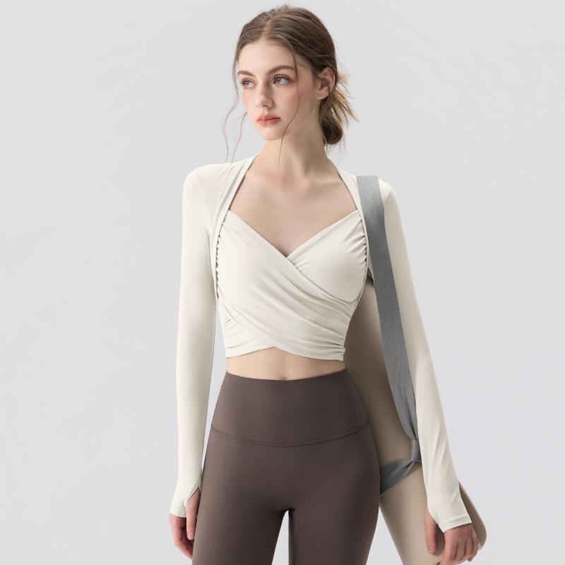 Yoga clothes women's 1011 new models with chest pads autumn and winter design sense sports long-sleeved Pilates training fitness top