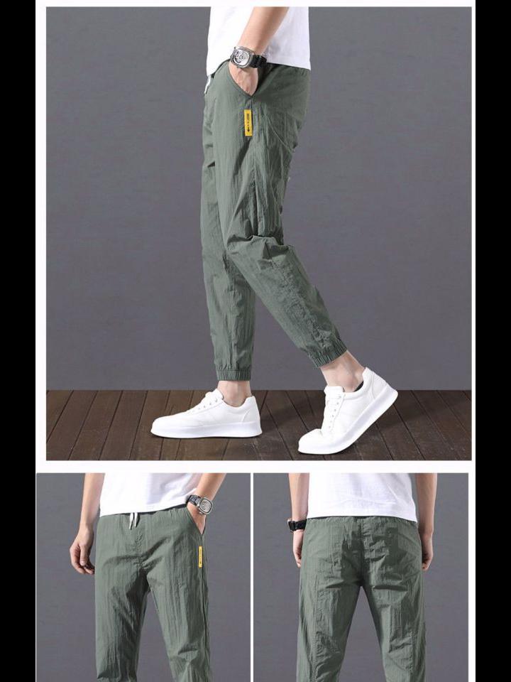 2023 Men's Korean-Style Ice Silk Casual Pants, Quick-Drying, Trendy, Loose-Fit Nine-Point Sports Pants for Summer.