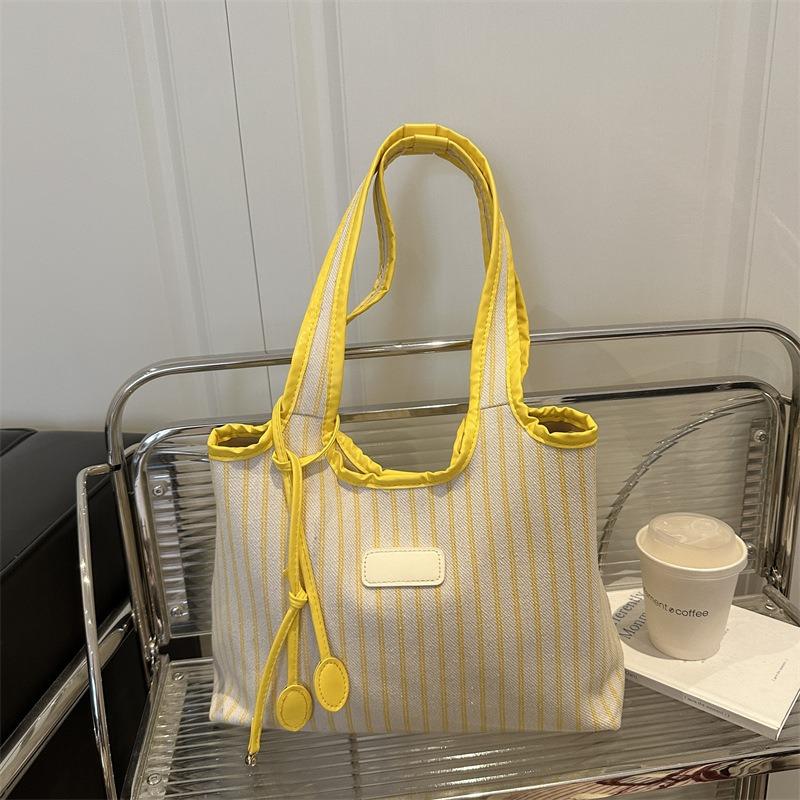 Large capacity tote bag women's new versatile canvas striped commuter shoulder bag women's casual armpit bag