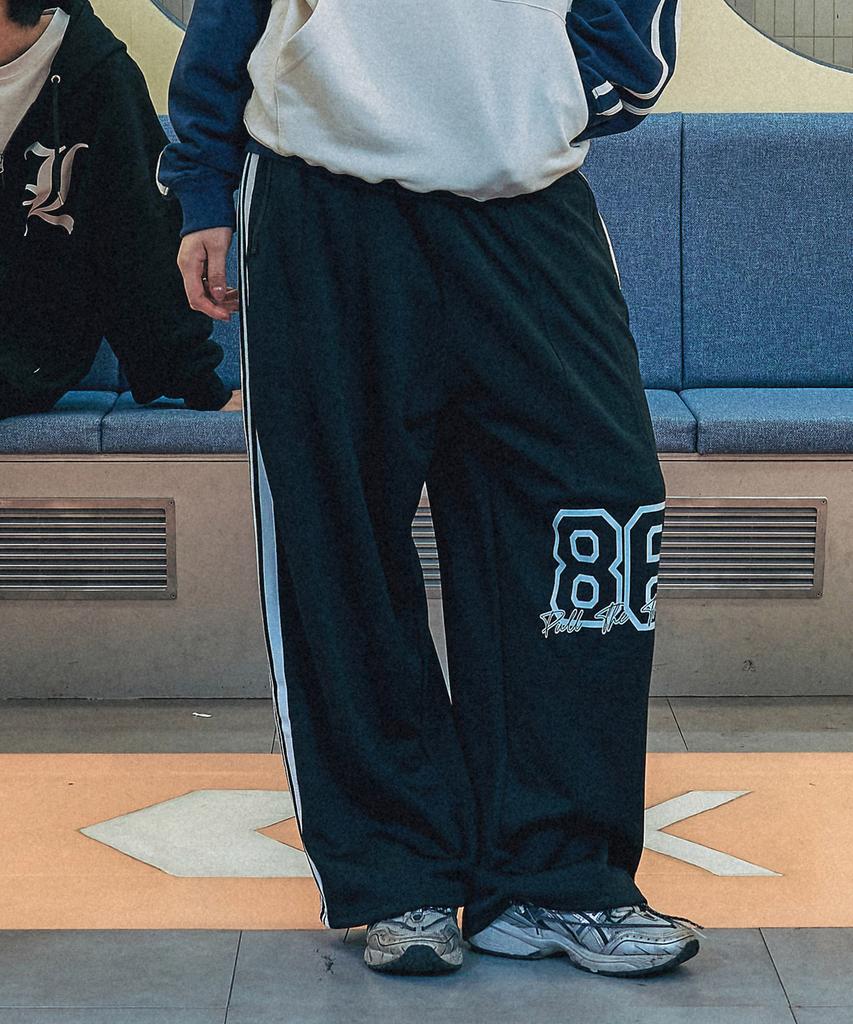 ELIMENO El 86 Trigger Cut Taping Track Pants 2 Colors