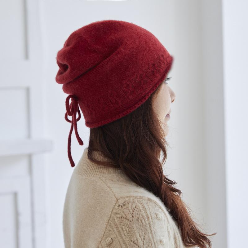 Cashmere autumn and winter new warm knitted drawstring stacking hat ear protector wool bag head cold hat