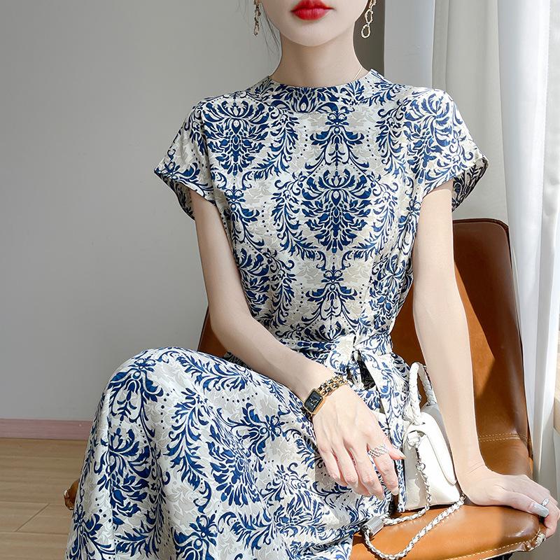 Tempérament taille haute au-dessus du genou qui épouse la silhouette vous fait paraître mince et pure Robe décontractée à imprimé pour l'été des femmes Satin Polyvalente Jupe longue cool
