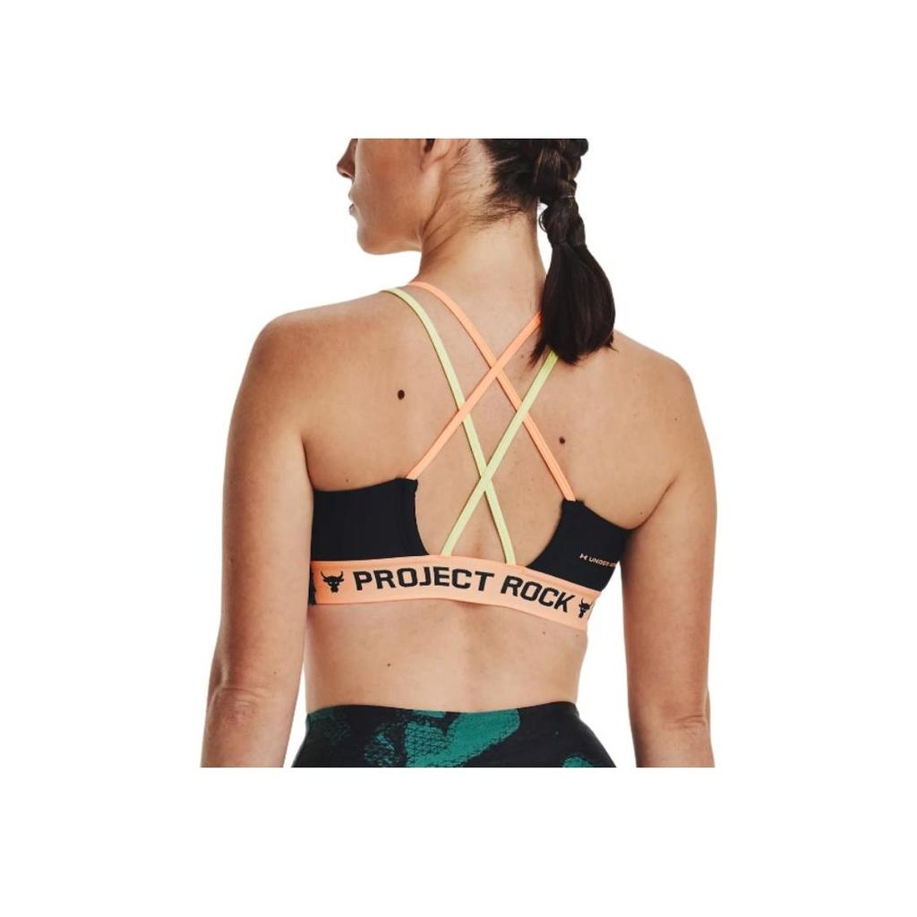 Under Armour Project Rock Potištěná sportovní podprsenka se střední podporou s kříženými zády Dámské spodní prádlo Mořsky modrá 1377953-722