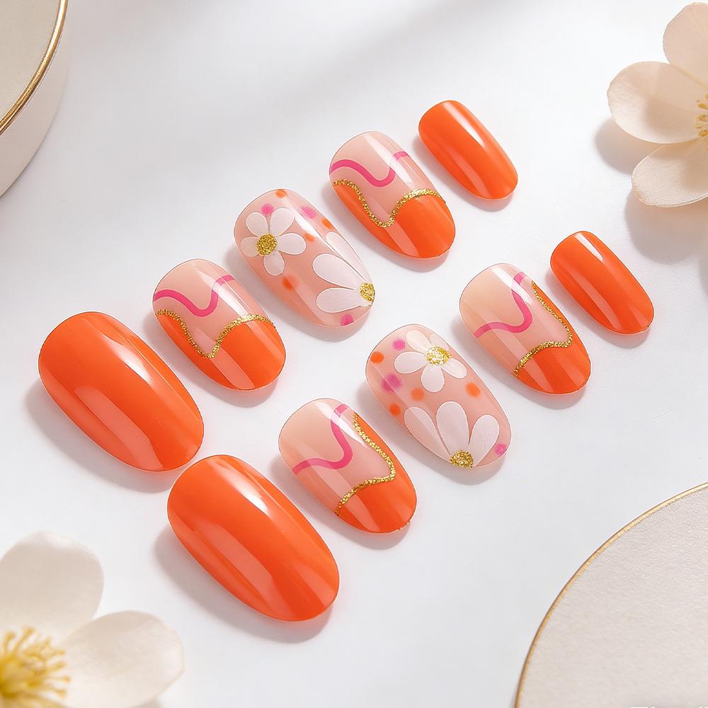 24-teilige glänzend goldene Glitzer-Pünktchen-Blumen-Falschnägel - Kurzes ovales Design