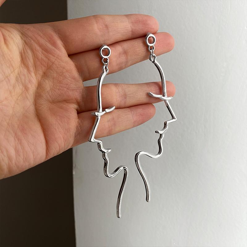 

Серьги для лица с абстрактным искусством