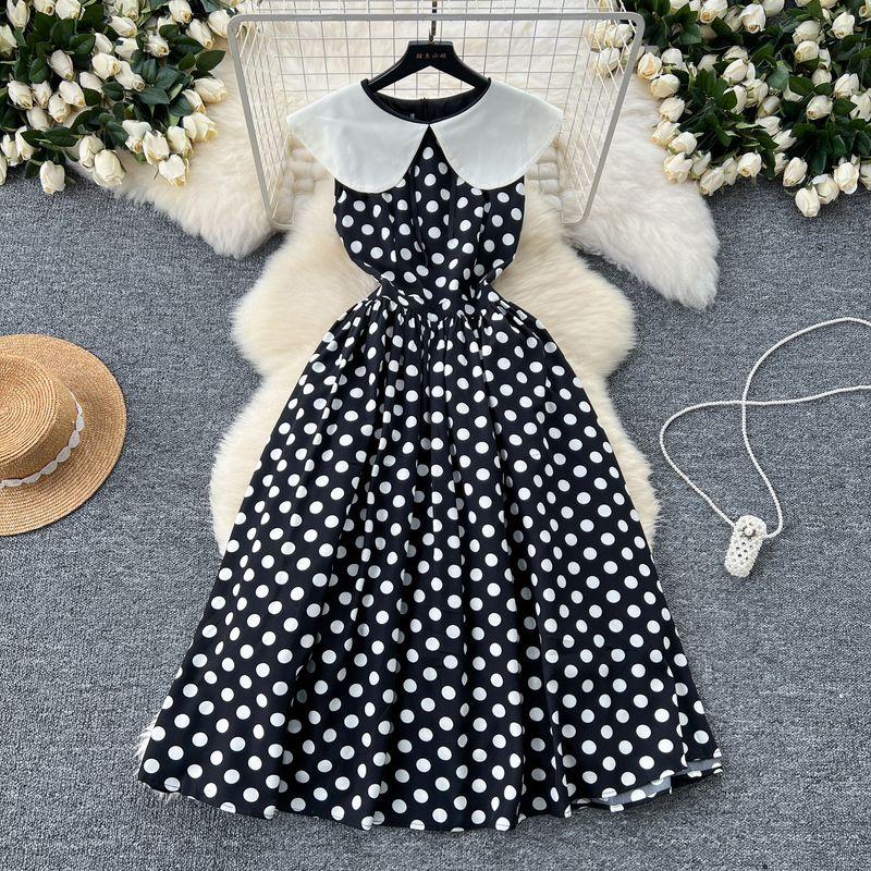 

Элегантное платье-социалитка приталенного силуэта в горошек контрастного цвета с плиссировкой Black 2XL