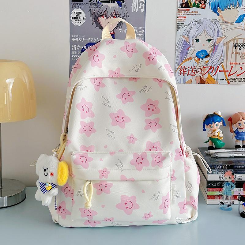 Nowy tornister jest wysokiej jakości, świeży, słodki i uroczy, a plecak w gwiazdki to lekki plecak podróżny dla uczniów gimnazjum.