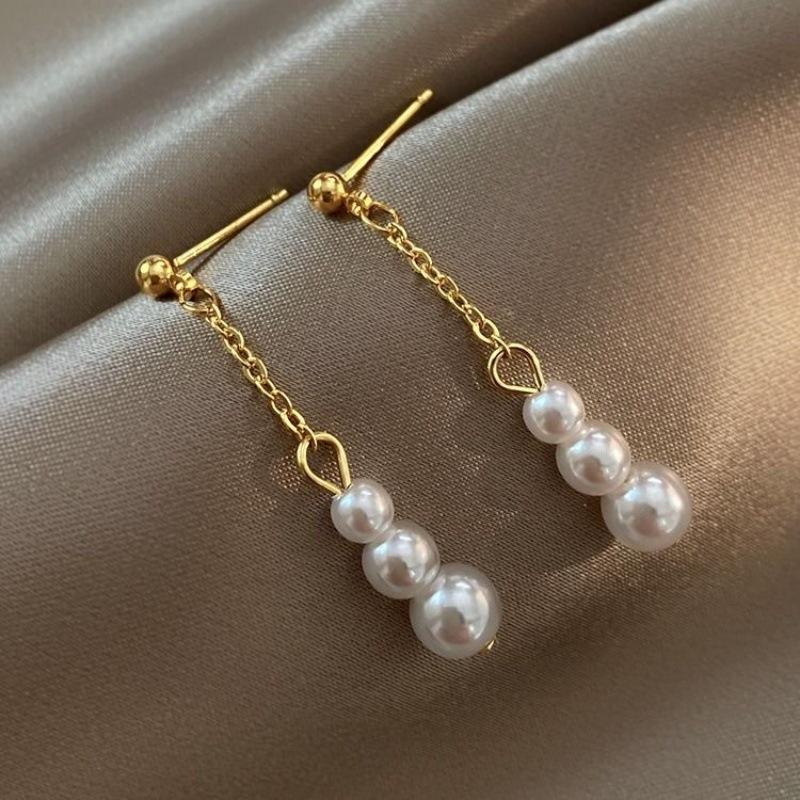 Stylish and simple three imitation pearl tassel long earrings women s niche design earrings, high-end temperament versatile earrings