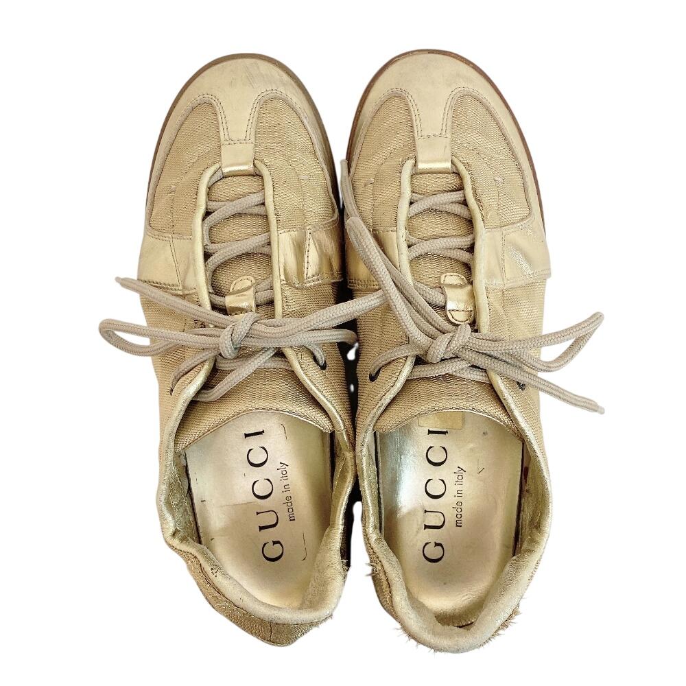 Gucci Niedrig geschnittene Leder-Sneaker goldfarbenes Leder Gebraucht