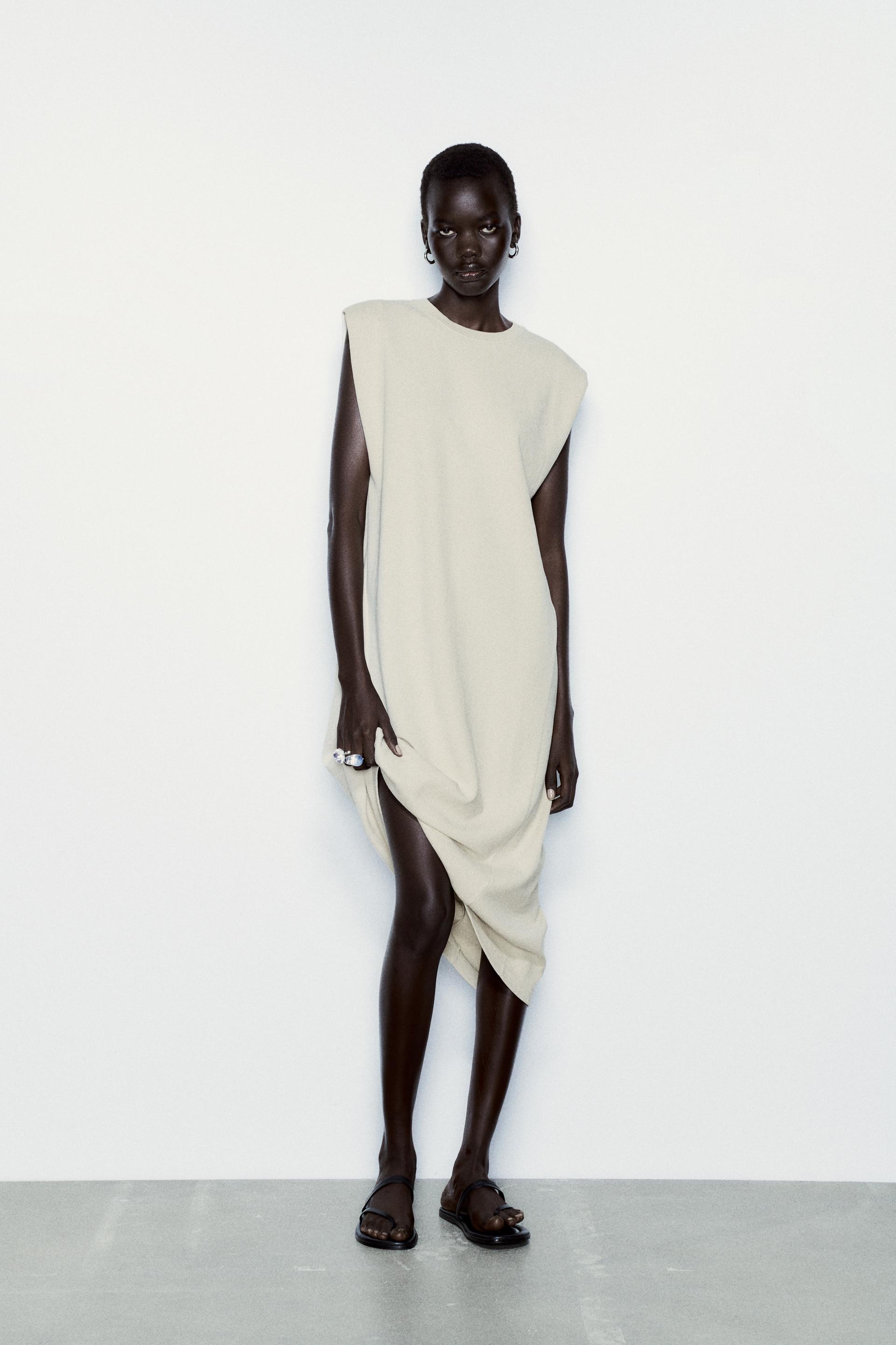 

ПЛАТЬЕ МИДИ С ВЫТЯЖЕННЫМ ЭФФЕКТОМ