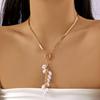 Stacked pearl necklace collection European and American retro baroque special-shaped pearl OT buckle blade snake chain tassel