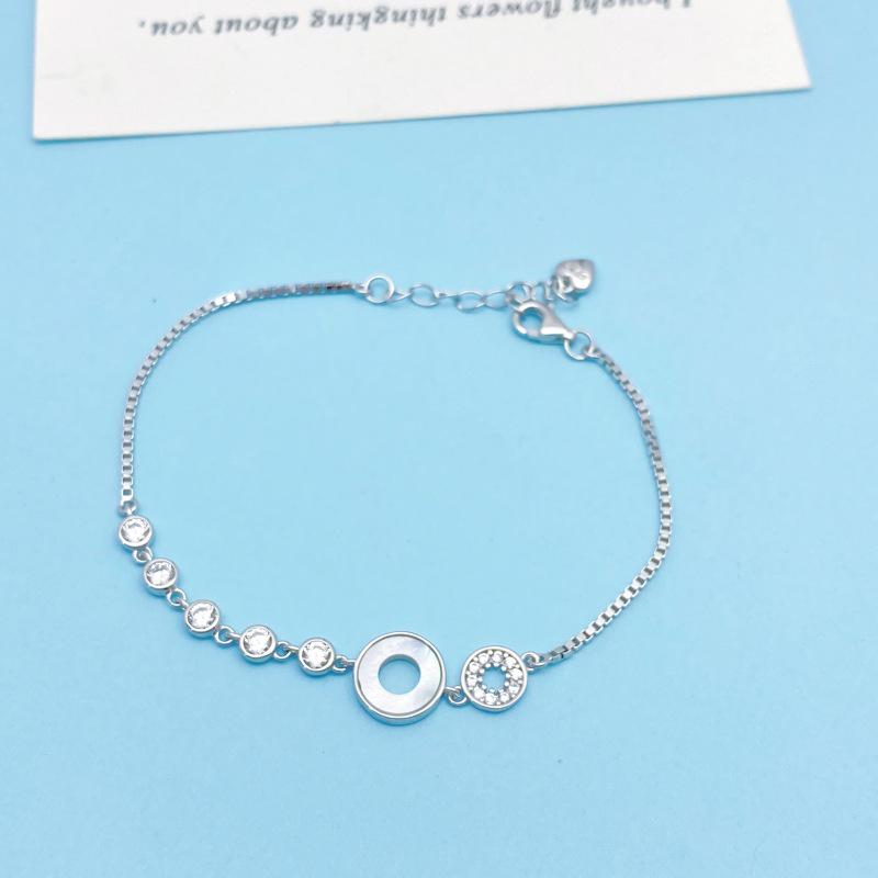 Elegant S925 Sterling Silver Mother-of-Pearl Round Bracelet - Modern, Luxurious, and Versatile Design. 925 Sterling Silver