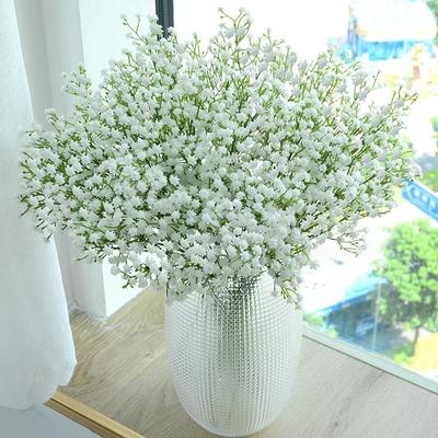 Decoração de casa – Flores e coroas artificiais